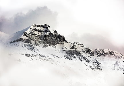mountain alp under cloudy sky thumbnail