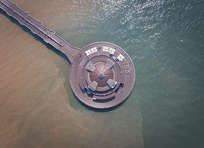 Aerial Photography of Round Brown Structure on Ocean thumbnail