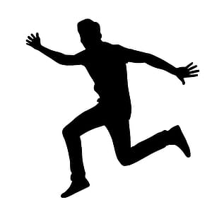 Silhouette of jumping excited man. thumbnail