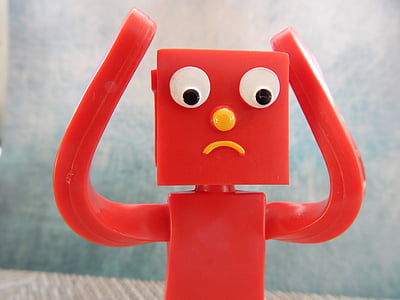 red plastic robot figure thumbnail