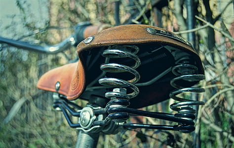 brown bicycle saddle with stainless steel spring thumbnail