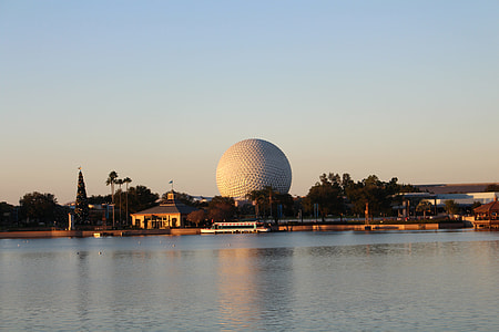 round building near body of water thumbnail