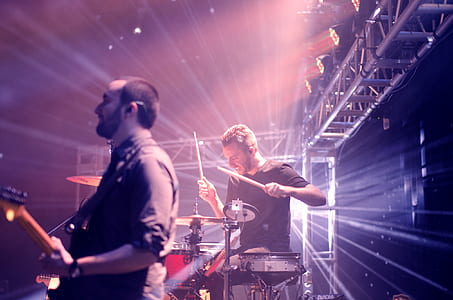 man playing drum doing live concert thumbnail