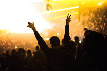 person in black dress shirt waving his hand up high thumbnail