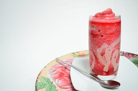 clear glass cup on white ceramic plate thumbnail
