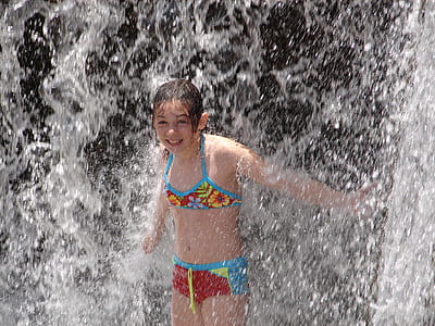 girl enjoying the waterfalls thumbnail