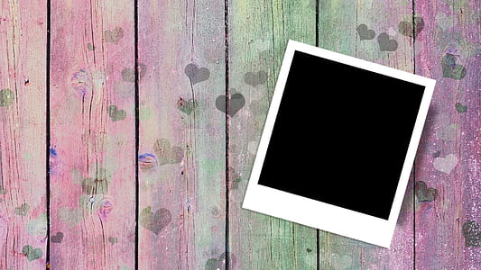white frame on wooden surface thumbnail