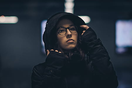 woman holding her hoodie jacket thumbnail