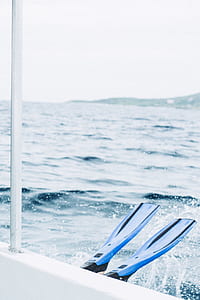 photo of person diving on body of water thumbnail