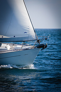 sailboat on calm body of water thumbnail
