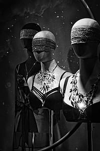 grayscale photo of three dress forms thumbnail