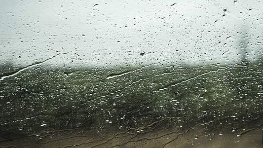 rain droplets on car windshield thumbnail
