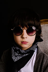boy taking selfie with round black sunglasses with black frames thumbnail