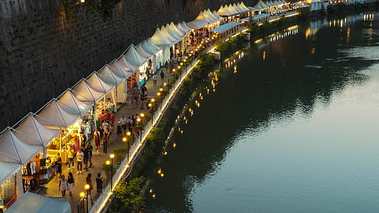 people near body of water thumbnail