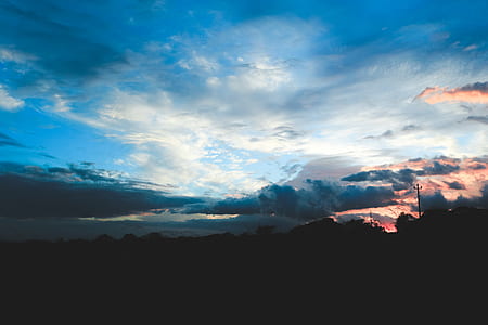 skies and clouds during daytime thumbnail