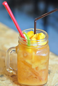 yellow juice in glass mason jar thumbnail