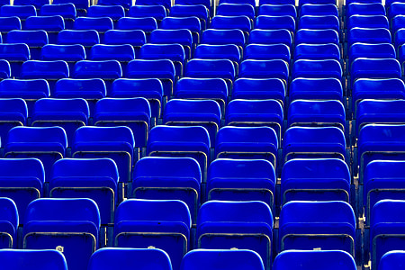 Blue seats in sports stadium thumbnail