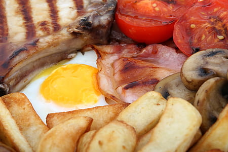 egg and fries with slice tomatoes thumbnail