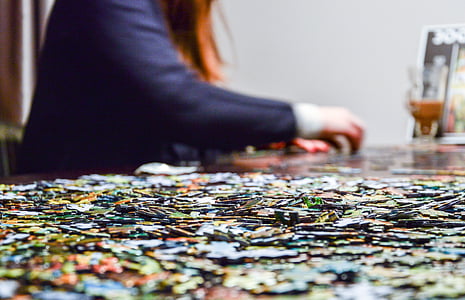 jigsaw puzzles on table thumbnail