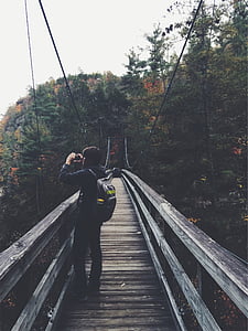 person holding camera thumbnail