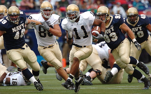 group of men playing football thumbnail