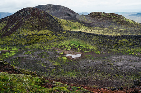 green mountain during daytime thumbnail