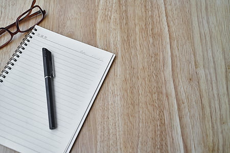 black pen on spring notebook thumbnail