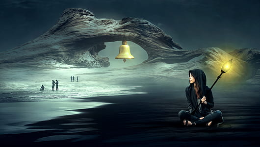 woman holding light post sitting on beach sand thumbnail