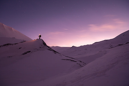 person standing on mountain thumbnail