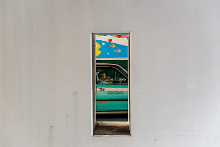 person riding on teal vehicle thumbnail
