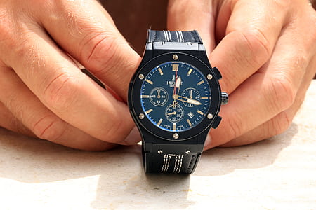 blue and black chronograph watch with leather band thumbnail