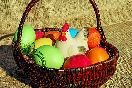 assorted-color eggs in brown basket thumbnail
