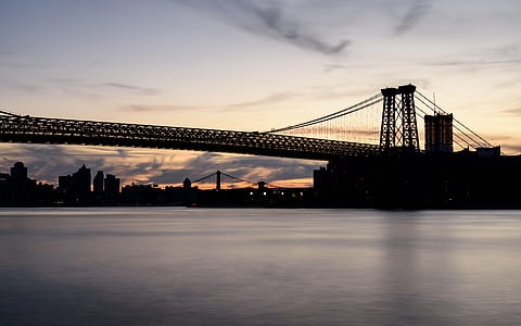landscape photo of bridge near body of water thumbnail