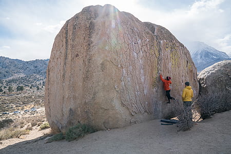 people climbing on rock thumbnail