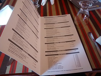 white and black menu on table thumbnail