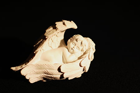 beige angel figurine thumbnail