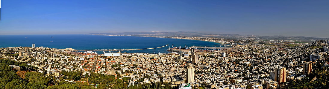 aerial view of city beside gulf during daytime thumbnail