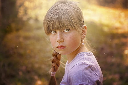 girl wearing purple top thumbnail