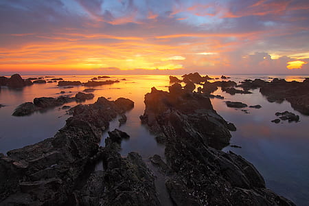 Rocks Near the Body of Water Landscape Photography thumbnail