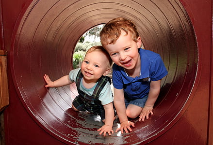 two toddlers inside the playground thumbnail