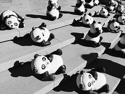 panda figurines on stair thumbnail