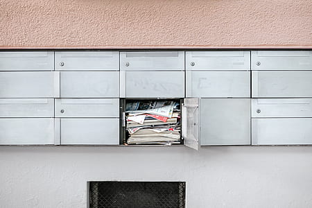 open cabinet in the middle of other closed cabinets thumbnail