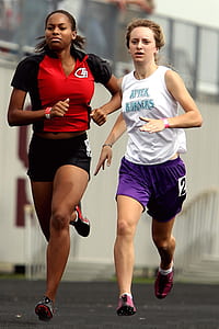 photo of two women running on street thumbnail