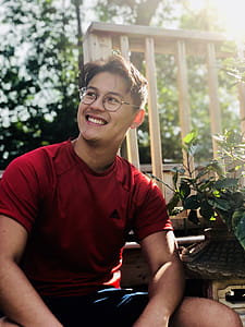 Man Wearing Red Shirt And Eyeglasses thumbnail