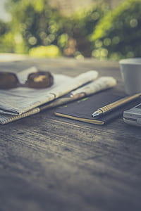 black book on table thumbnail