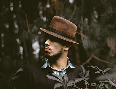 man wearing brown hat in fprest thumbnail