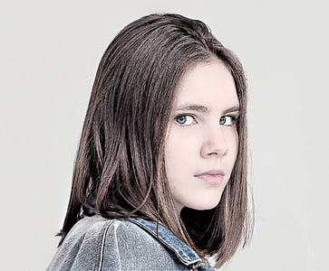 woman in blue denim top thumbnail