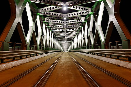 photography of lighted bridge at night thumbnail