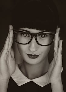 grayscale photograph of woman wearing wayfarer-style sunglasses thumbnail