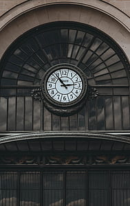 round black analog clock during daytime thumbnail